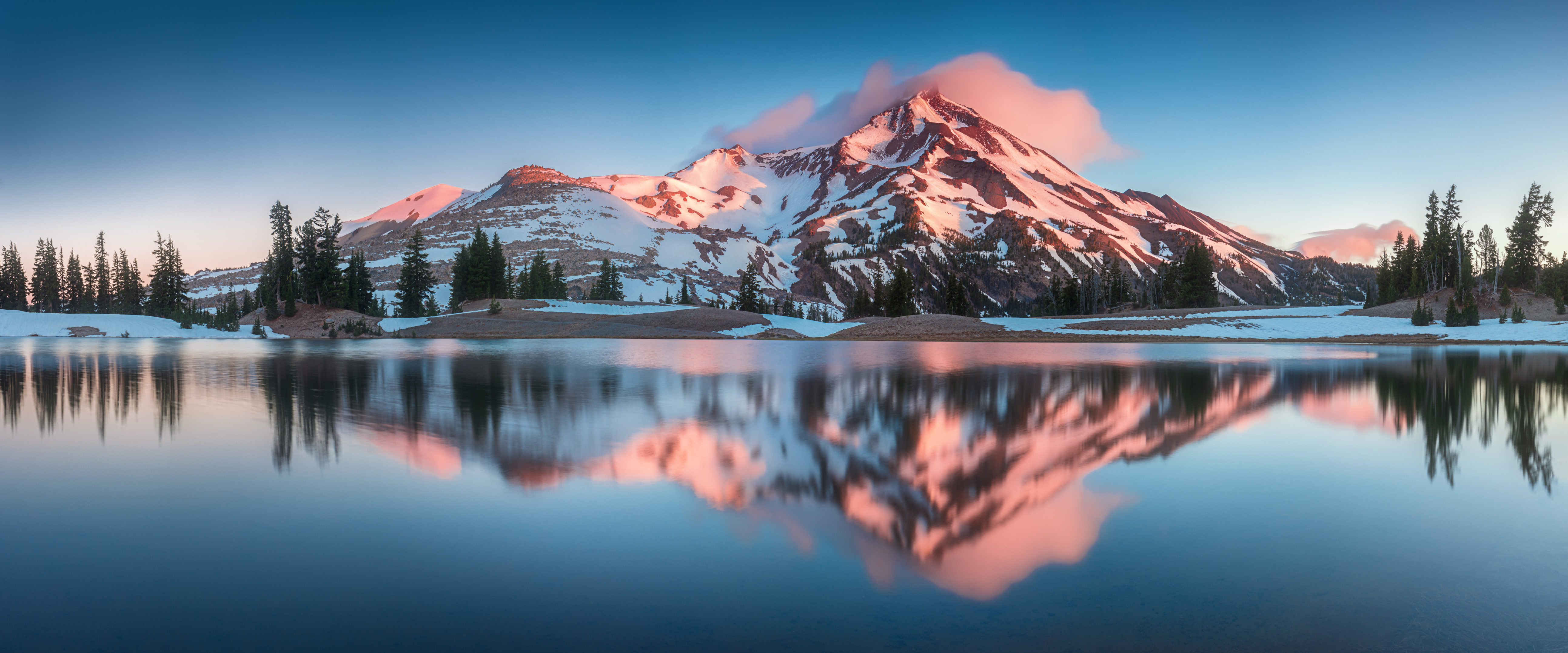 Summer Sunrise South Sister mountains in central Oregon near Bend are reflected in Green Lakes. Mountains in the cascade Range of Oregon, USA Beautiful landscape background - Image