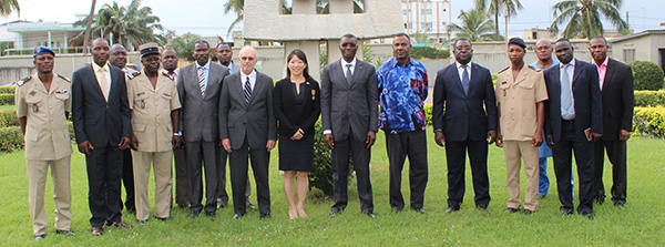 Agent Noriko (center) and Togo’s U.S. Ambassador Robert Whitehead (to Agent Noriko’s right) attend an award ceremony on August 19, 2014. On behalf of Togo’s president, Togo’s minister of security (to Agent Noriko’s left) knighted Agent Noriko with the “Chevalier de l’ordre du mono” for successfully carrying out important bilateral law-enforcement efforts. (U.S. Department of State photo)