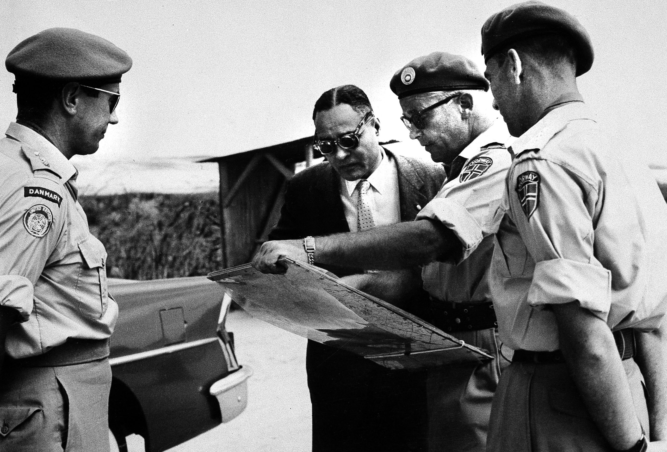 Ralph Bunche with Norwegian officers while visiting a UN Emergency Force observation post.
