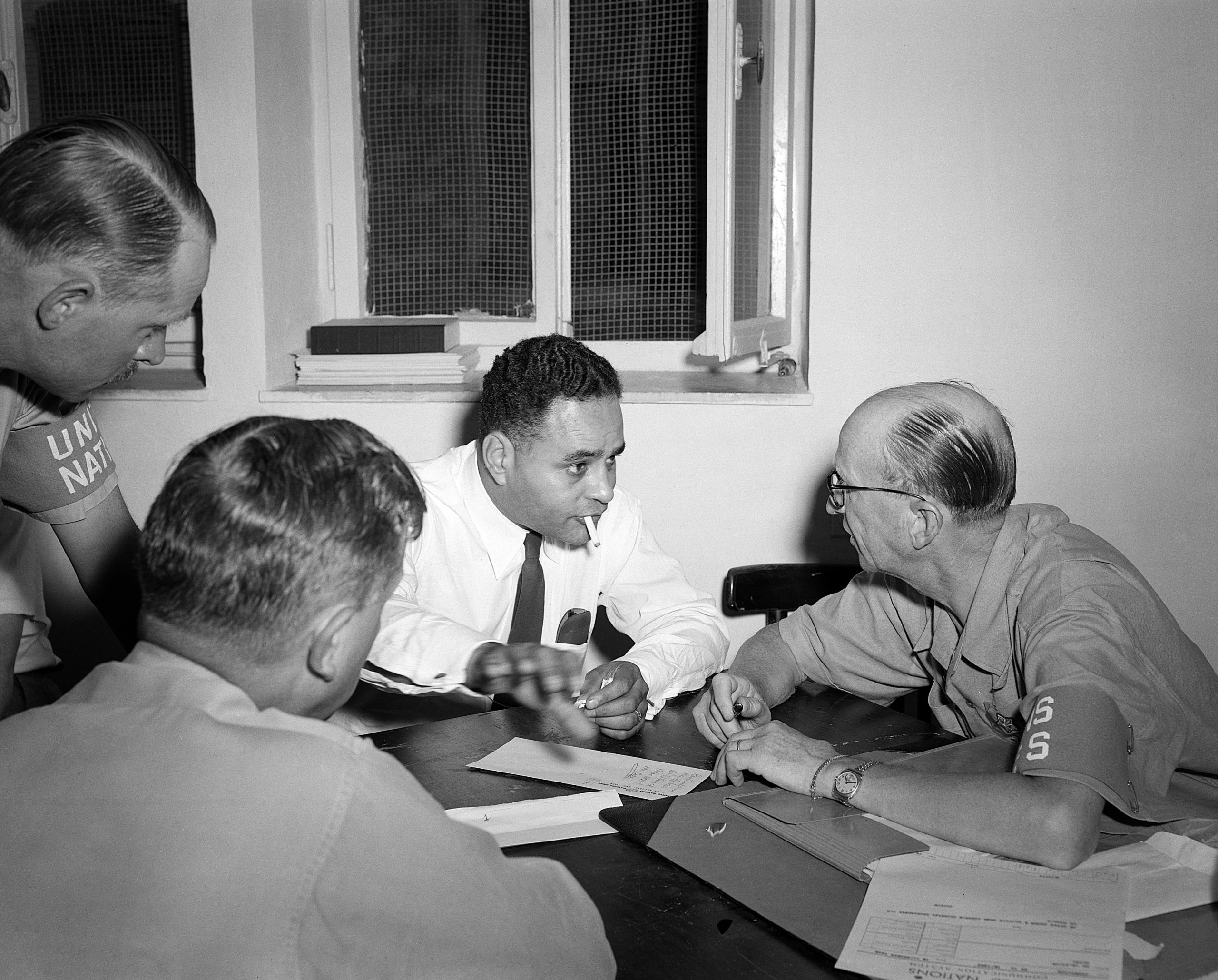 Ralph Bunche at a table negotiating in 1949.