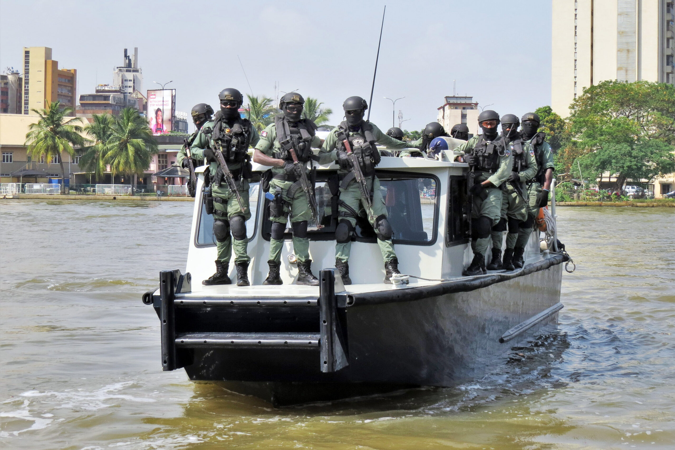 Nigerian police assigned to protect U.S. diplomatic facilities and personnel operate one of their patrol boats in the coastal city of Lagos in November 2020. The police are part of a Special Program for Embassy Augmentation Response (SPEAR) team. SPEAR teams are quick-response forces trained and funded by the Diplomatic Security Service’s Office of Antiterrorism Assistance (ATA). (Department of State photo)