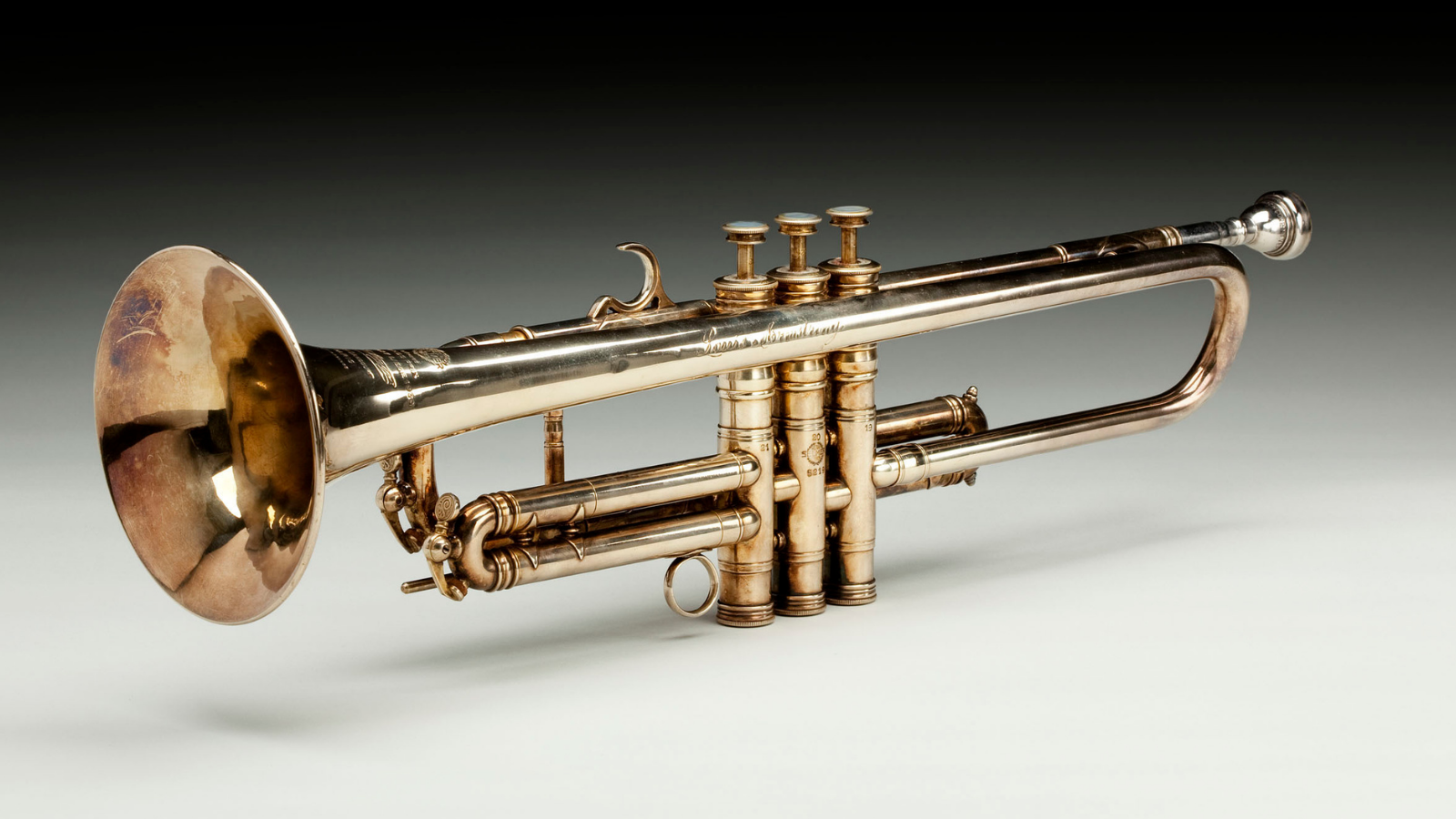 One-of-a-kind brass-and-gold trumpet owned and played by Louis Armstrong circa 1946, photographed on October 19, 2015. (Photo courtesy of the National Museum of African American History and Culture)