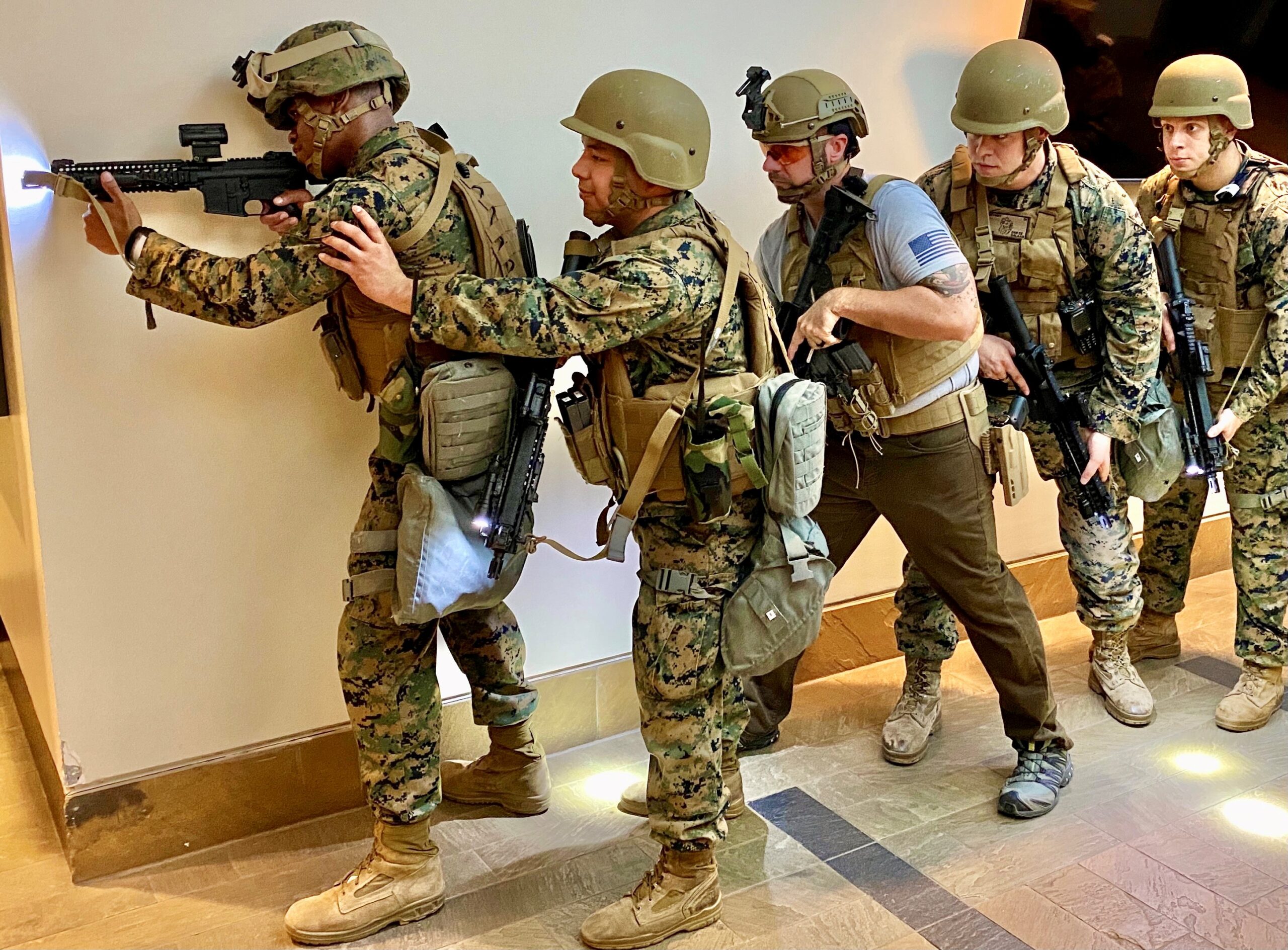 DSS special agents and Marine Security Guards stack up during an exercise at the U.S. Embassy in Dar es Salaam, Tanzania on July 6, 2021. (U.S. Department of State photo).