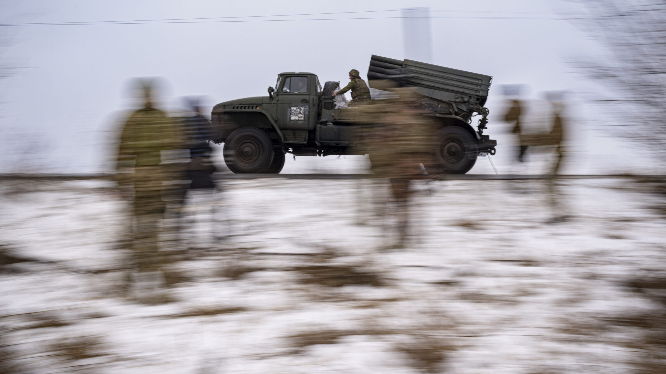 A Ukrainian military Soviet era GRAD multiple rocket launcher, attached to the Prince Roman the Great 14th Separate Mechanized Brigade, is driven away after firing at Russian positions in the Kharkiv area, Ukraine, Feb. 25, 2023.
