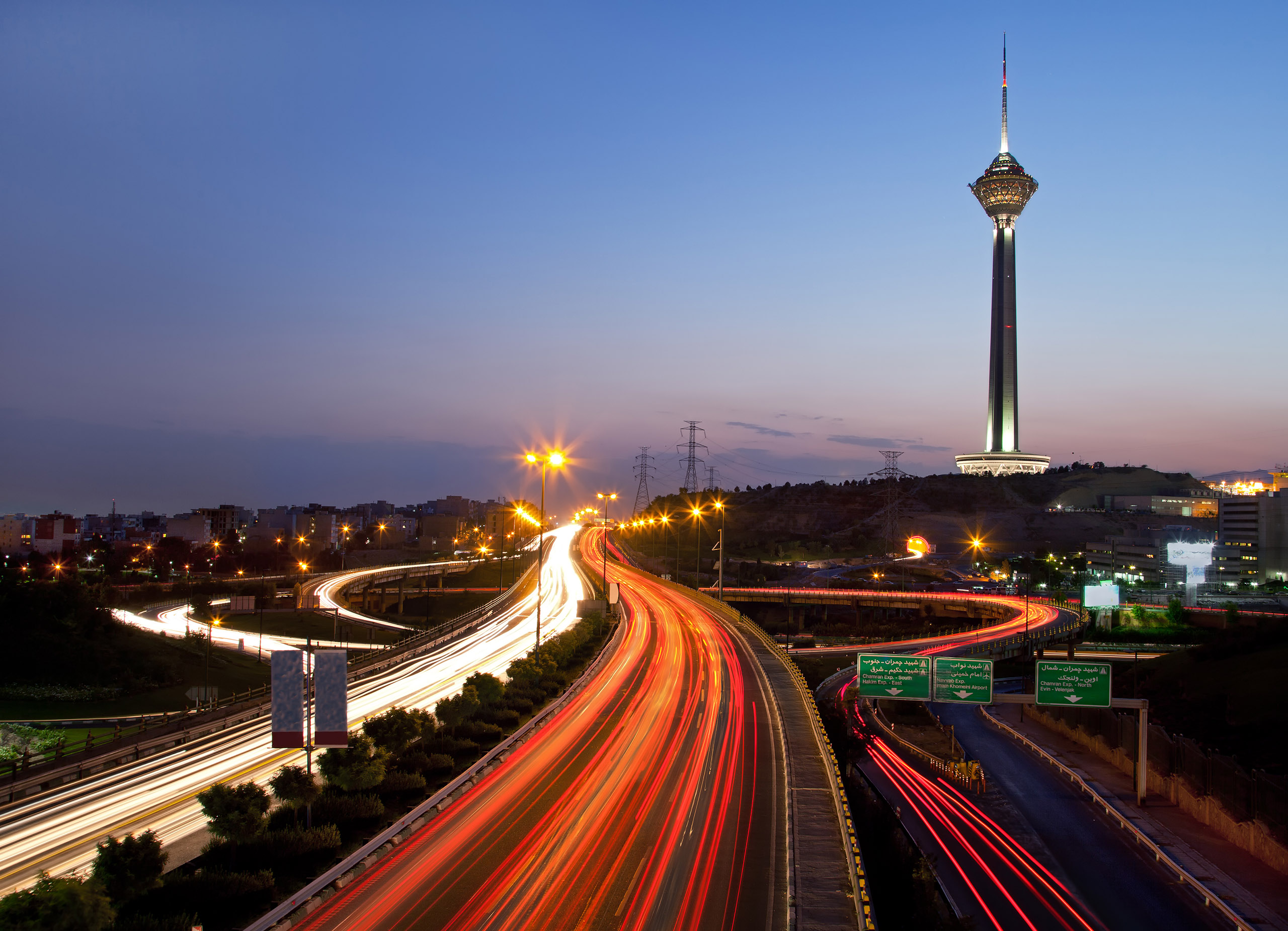 TEHRAN - JULY 16: Night shot from streets of Tehran and Illuminated Milad Tower on July 16, 2011 in Tehran, Iran. Milad Tower is the second most important landmark of Tehran, after Azadi Monument.