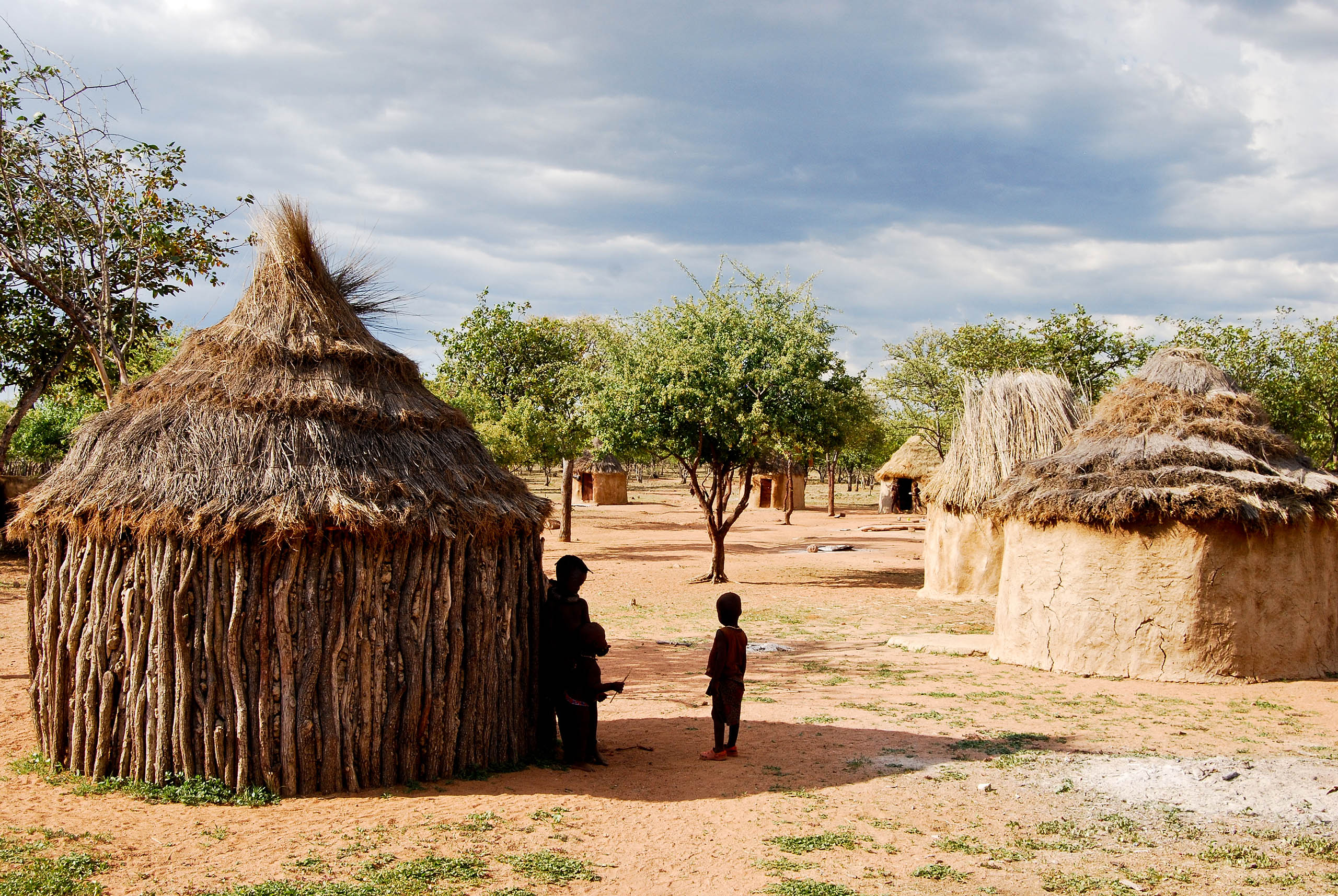 Himba village with traditional huts near Etosha National Park in Namibia, Africa