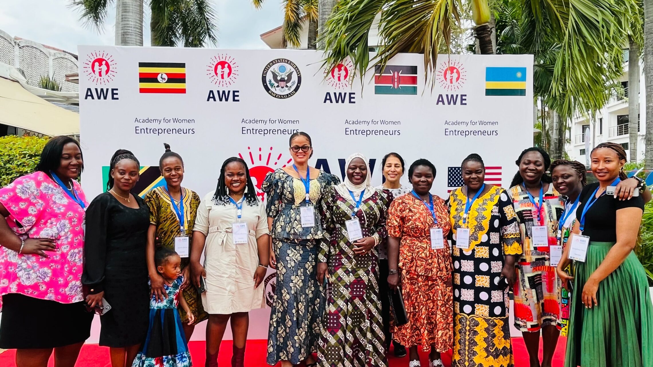 Academy for Women Entrepreneurs alumni pose for a group photo while attending the first East Africa AWE Summit in Dar es Salaam, Tanzania, in July 2023.